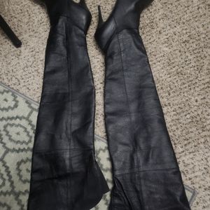 Over the thigh, high heel, pointed toe boots